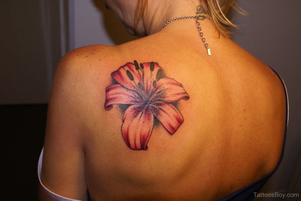 1. "Delicate Floral Back Tattoo" - wide 6