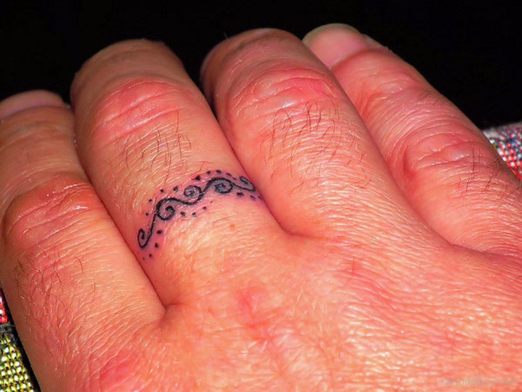 Toe ring tattoo