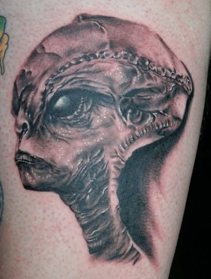 Alien Face Tattoo