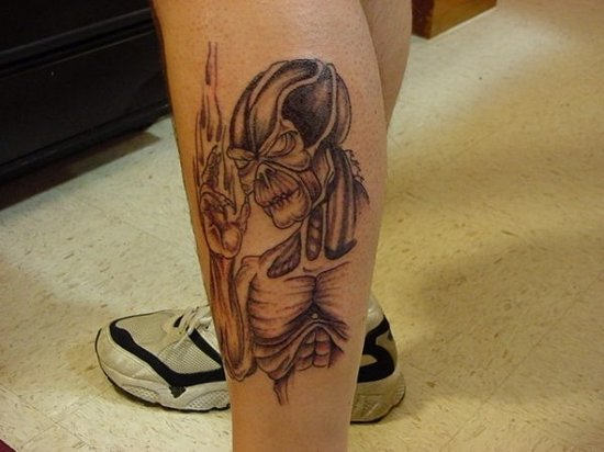 Alien Tattoo On Leg