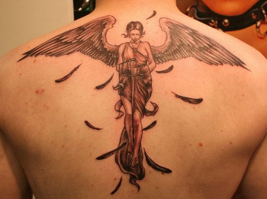 Large Sad Angel Tattoo On Back