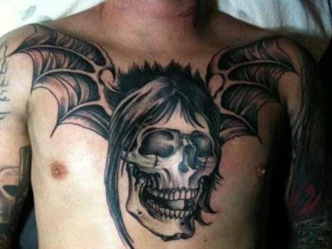 Skull Bat Tattoo On Chest