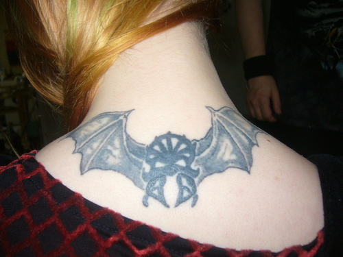 Bat Tattoo On Neck