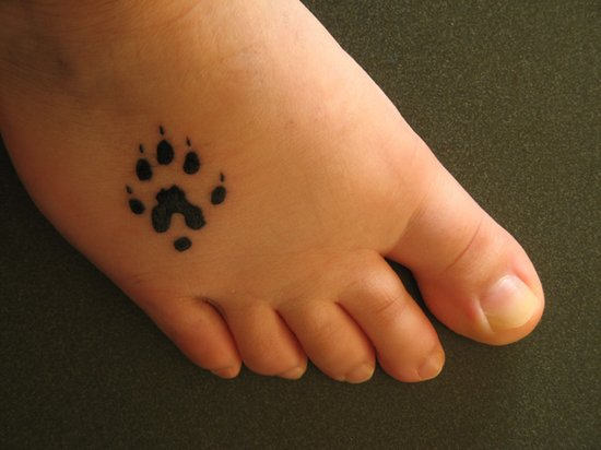 Little Paw Print Tattoo On Foot