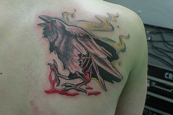 Weird Crow Tattoo On Back