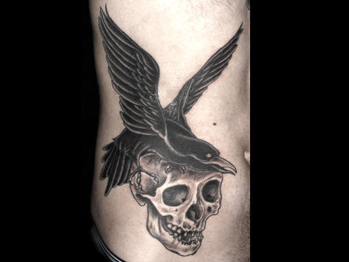 Bird & Skull Tattoo On Rib