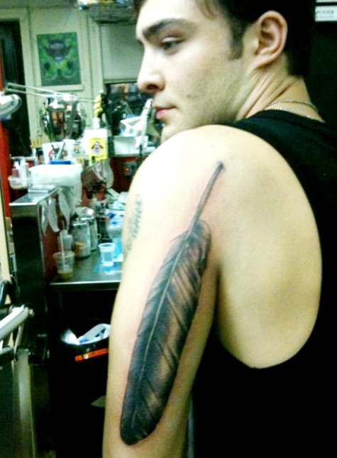 Stylish Feather Tattoo on Arm