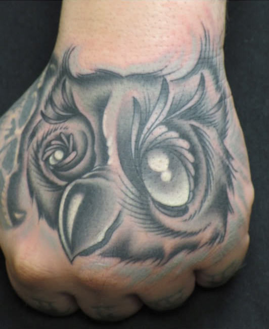Owl Face Tattoo On Hand 