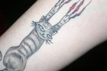 Cat Scratching Tattoo