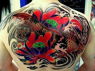 Colorful Fish Tattoo on Back