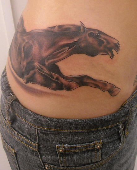 Running Horse Tattoo on Lower Back
