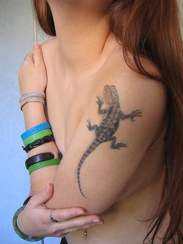 Girl Showing Her Lizard Tattoo
