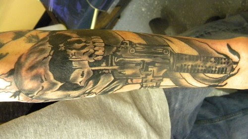 Gun Tattoo on Arm