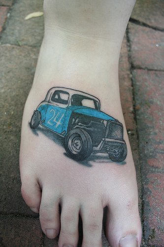 Car tattoo on foot
