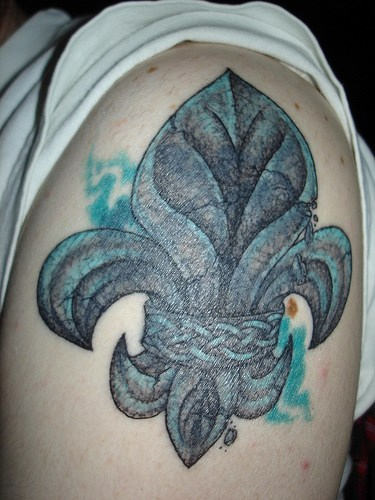 Beautiful Fleur de lis Tattoo Design on Bicep