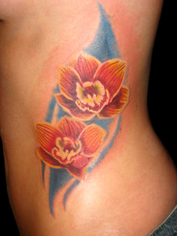 Orchid Flowers Tattoo On Rib