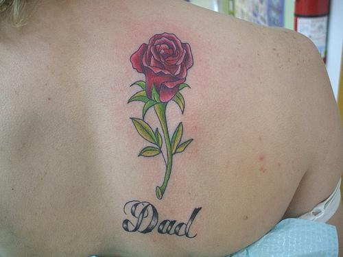 Memorable Flowers Tattoo On Back