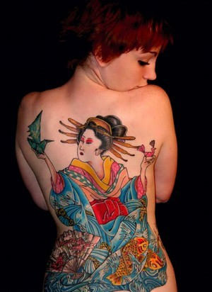 Girl Showing her Elegant Geisha Tattoo