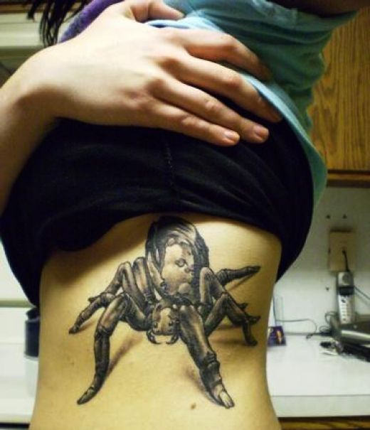 Latino Spider Tattoo On Rib