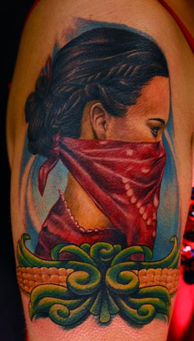 Latino Girl Tattoo On Shoulder
