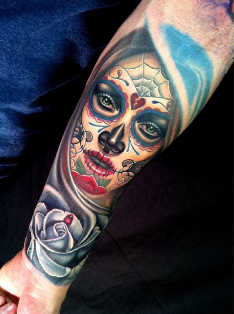 Latino Girl Tattoo On Arm