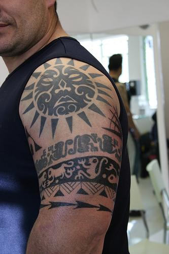 Polynesian Sun Tattoo On Shoulder