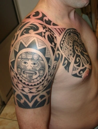 Polynesian Tattoo On Chest and Shoulder