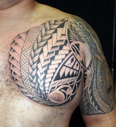 Polynesian Tattoo On Shoulder and Chest