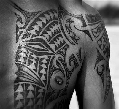 Polynesian Tattoo On Chest and Shoulder