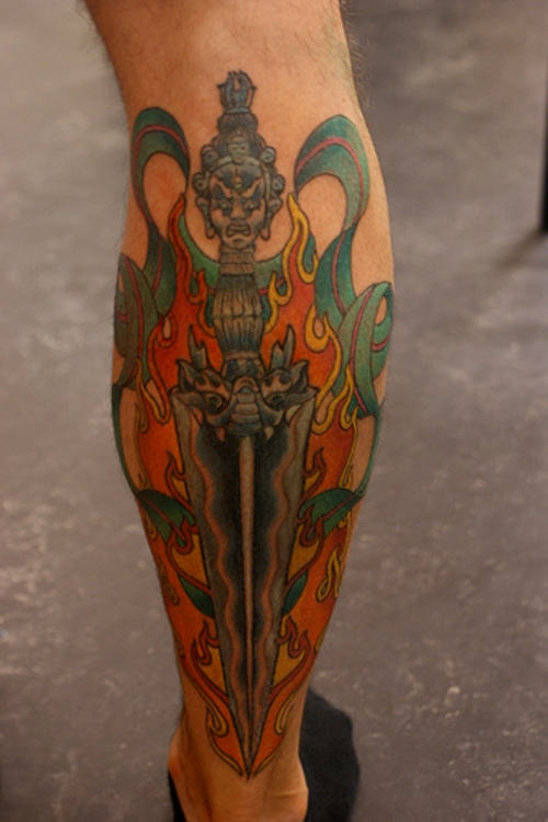 Tibetan Tattoo On Leg