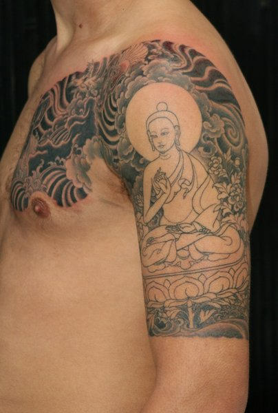 Tibetan Tattoo On Shoulder & Chest