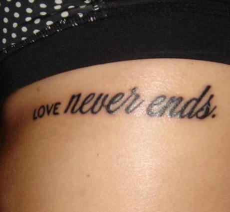 Love Tattoo On Rib