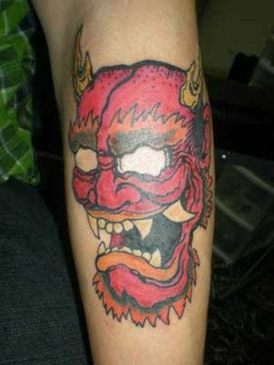 Pink Mask Tattoo On Arm