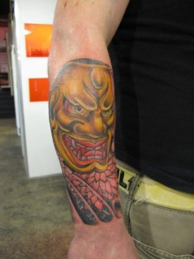 Mask Tattoo On Arm