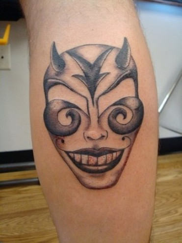 Mask Tattoo On Leg