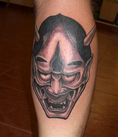 Laughing Mask Tattoo