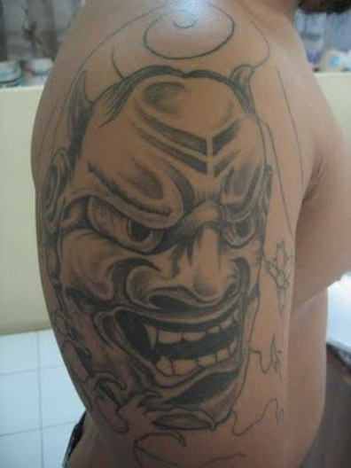 Mask Tattoo On Shoulder