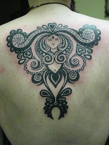 Designing Mermaid Tattoo On Back