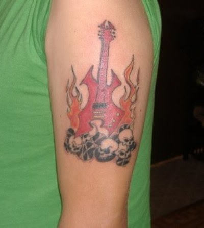 Fiery Guitar Tattoo On Shoulder