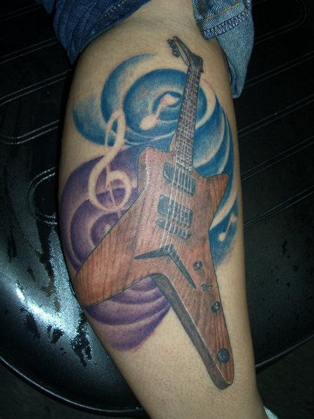 Guitar Tattoo On Leg