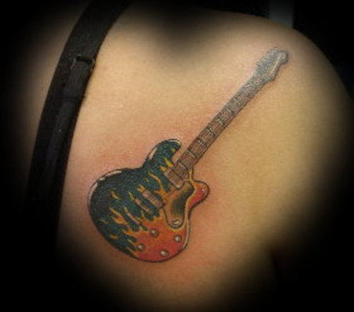 Burning Guitar Tattoo On Back