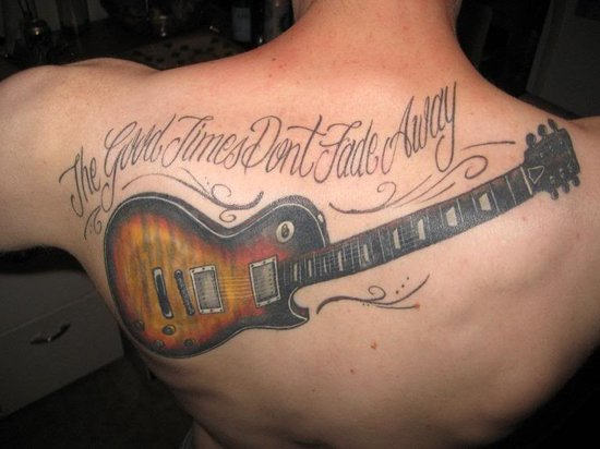 Guitar & Words Tattoo On Back