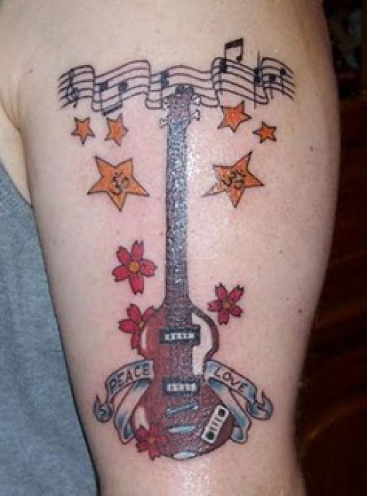 Guitar Tattoo On Shoulder