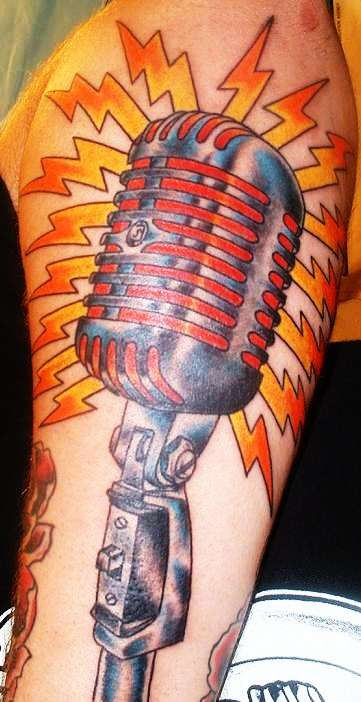 Excellent Mic Tattoo On Shoulder