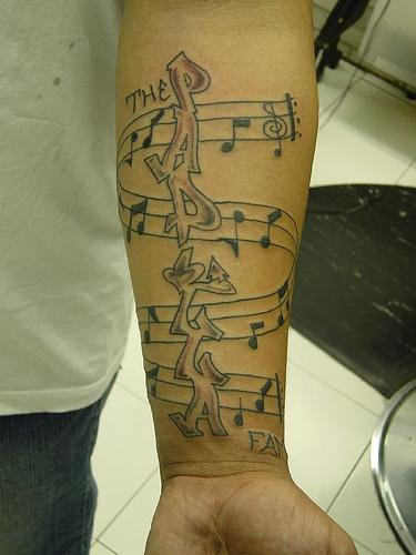 Music Tattoo On Arm | Tattoo Designs, Tattoo Pictures
