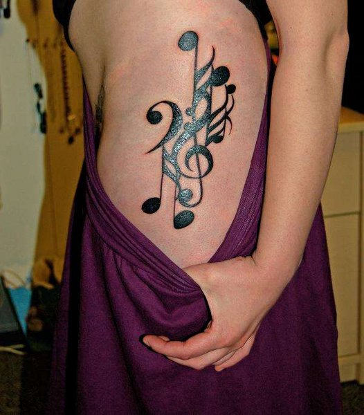 Music Tattoo On Waist
