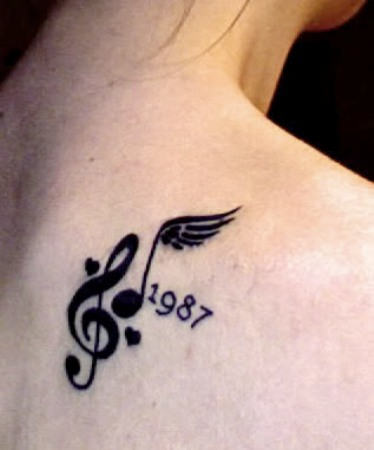 Memorial Music Tattoo On Back