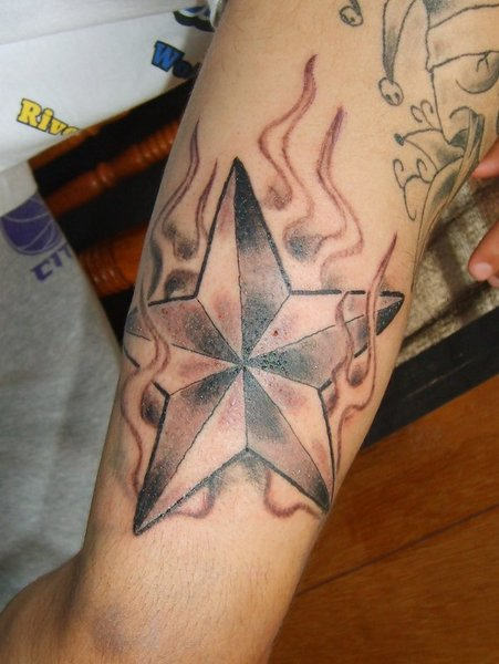Burning Nautical Star Tattoo
