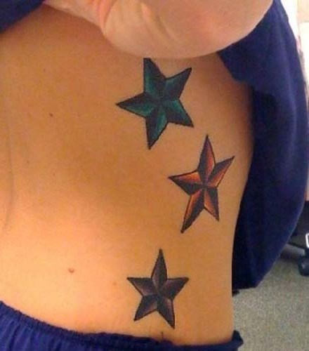 Three Nautical Stars Tattoo On Rib