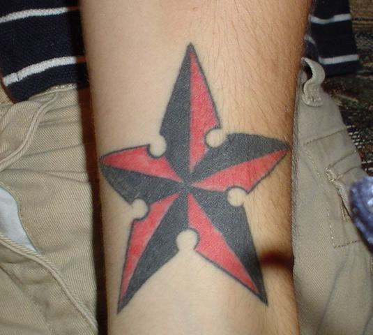 Nautical Star Tattoo On Arm